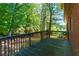 Spacious back deck overlooks a lush, green backyard, perfect for outdoor entertaining and relaxation at 28 Indian Branch Way, Lawrenceville, GA 30043