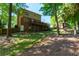 Large backyard with a multilevel deck that extends from the brick house at 28 Indian Branch Way, Lawrenceville, GA 30043