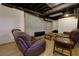 Partially finished basement space with wood-look flooring at 28 Indian Branch Way, Lawrenceville, GA 30043