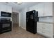 Well-equipped kitchen with modern appliances, ample cabinetry, and a seamless flow to other living spaces at 28 Indian Branch Way, Lawrenceville, GA 30043
