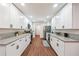 Bright and modern kitchen with stainless steel appliances and granite countertops at 3708 Canadian Way, Tucker, GA 30084