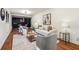 Comfortable living room with plush seating, stylish decor, and hardwood floors at 3708 Canadian Way, Tucker, GA 30084