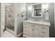 Modern bathroom with glass-enclosed shower and stylish white marble vanity, offering a clean and inviting space at 407 River Mill Cir # 407, Roswell, GA 30075
