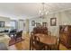 Bright dining area with hardwood floors and classic furnishings at 407 River Mill Cir # 407, Roswell, GA 30075