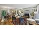 Bright living room featuring fireplace, hardwood floors, and elegant furnishings at 407 River Mill Cir # 407, Roswell, GA 30075