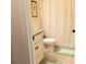 Bathroom featuring a toilet, granite vanity, and soft neutral accents at 101 Dewey Rd, Lilburn, GA 30047