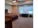 Spacious bedroom with a king-size bed, large windows with blinds, and ample natural light at 101 Dewey Rd, Lilburn, GA 30047