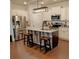 Stylish kitchen with stainless steel appliances, a kitchen island, and plenty of storage at 101 Dewey Rd, Lilburn, GA 30047