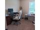 Office with computer, desk, and office chair at 101 Dewey Rd, Lilburn, GA 30047