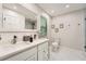 Bright bathroom featuring a double sink vanity, a large mirror, and a glass-enclosed shower at 1080 Northshore Dr, Roswell, GA 30076