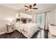 Cozy bedroom featuring a bunk bed, a ceiling fan, and large windows at 1080 Northshore Dr, Roswell, GA 30076