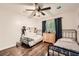 Shared bedroom featuring hardwood floors, two beds, and natural light at 1080 Northshore Dr, Roswell, GA 30076