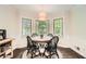Charming dining nook with a round table, classic chairs, and bright windows at 1080 Northshore Dr, Roswell, GA 30076