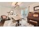 Elegant dining room with wood table, chandelier, and natural light at 1080 Northshore Dr, Roswell, GA 30076