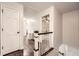 Bright hallway features hardwood floors, white trim, and a view into the adjacent room at 1080 Northshore Dr, Roswell, GA 30076