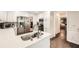 Bright kitchen with stainless steel appliances, quartz countertops, and modern fixtures at 1080 Northshore Dr, Roswell, GA 30076