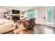 Cozy living room featuring a fireplace, built-in shelving, and comfortable seating at 1080 Northshore Dr, Roswell, GA 30076