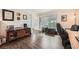 Well-lit home office with hardwood floors, wooden furniture, and a comfortable chair at 1080 Northshore Dr, Roswell, GA 30076
