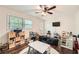 Bright playroom with hardwood floors, ceiling fan, and filled with toys and games at 1080 Northshore Dr, Roswell, GA 30076