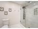 Bright bathroom featuring a glass-enclosed shower and modern fixtures at 1080 Northshore Dr, Roswell, GA 30076