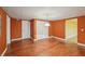 Basement area featuring laminate floors and access to other rooms at 1420 Arblay Pl, Loganville, GA 30052