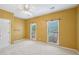 Bedroom with windows that let in light and carpet flooring throughout at 1420 Arblay Pl, Loganville, GA 30052