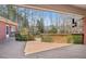 Wooden deck area overlooking the trees and backyard at 1420 Arblay Pl, Loganville, GA 30052