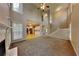 Open-concept living room boasting a fireplace and staircase at 2001 Fairbrook Ln, Woodstock, GA 30189