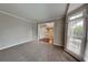 Cozy living room with large windows and trim at 2001 Fairbrook Ln, Woodstock, GA 30189