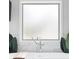 Close up of soaking tub with large window and greenery nearby at 2622 Running River Ct, Lawrenceville, GA 30045