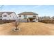 Spacious backyard featuring a lush lawn and mature trees, offering a serene outdoor space at 380 Parkside Meadow Dr, Marietta, GA 30064