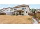 Expansive backyard with a covered patio and enclosed structure, perfect for gardening or storage at 380 Parkside Meadow Dr, Marietta, GA 30064