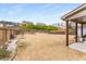 Large, grassy backyard enclosed by a wooden fence, offering privacy and space for outdoor activities at 380 Parkside Meadow Dr, Marietta, GA 30064