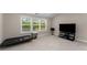 Bonus room featuring carpet flooring, a large window for natural light, and plenty of space for activities at 380 Parkside Meadow Dr, Marietta, GA 30064