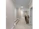 Bright hallway with lighting, and access to other rooms, offering a seamless flow throughout the home at 380 Parkside Meadow Dr, Marietta, GA 30064