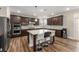 Modern kitchen with stainless steel appliances, granite countertops, and a large center island at 380 Parkside Meadow Dr, Marietta, GA 30064