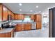 Well-equipped kitchen with granite countertops, stainless steel appliances, and ample cabinet space at 1621 Dixie Rd, Covington, GA 30014