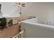 Playful upstairs bedroom features a ceiling fan and neutral walls at 210 Cottonwood Creek Cir, Canton, GA 30114