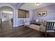 Comfortable living room featuring luxury vinyl plank flooring and soft, natural lighting at 211 Parc Dr, Canton, GA 30114