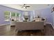 Spacious living room features a fireplace, ample seating, and natural light at 211 Parc Dr, Canton, GA 30114