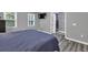 A relaxing bedroom with an en suite bathroom and plenty of natural light at 3910 Meeting St, Duluth, GA 30096