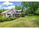 Spacious backyard with a patio area, perfect for outdoor entertaining and relaxation at 4930 Forestglade Ct, Tucker, GA 30087