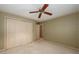 Bedroom with a ceiling fan and closet at 4930 Forestglade Ct, Tucker, GA 30087