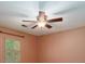 Spacious bedroom featuring a ceiling fan and ample natural light from a window at 4930 Forestglade Ct, Tucker, GA 30087