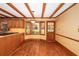Eat-in kitchen with wood cabinets and bay window to the backyard at 4930 Forestglade Ct, Tucker, GA 30087
