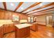 Spacious kitchen with wood cabinets, central island and tiled countertops at 4930 Forestglade Ct, Tucker, GA 30087