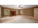 Spacious main bedroom with fireplace, shutters, and neutral paint at 4930 Forestglade Ct, Tucker, GA 30087