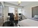 Bedroom featuring two workstations, two windows, and a ceiling light at 1300 Dekalb Ne Ave # 731, Atlanta, GA 30307