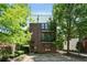 Beautiful multi-story brick building with mature trees and dedicated parking at 1300 Dekalb Ne Ave # 731, Atlanta, GA 30307
