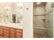 This bathroom features a double sink vanity and a glass enclosed shower with a built-in bench at 2672 Brickell Square, Atlanta, GA 30341